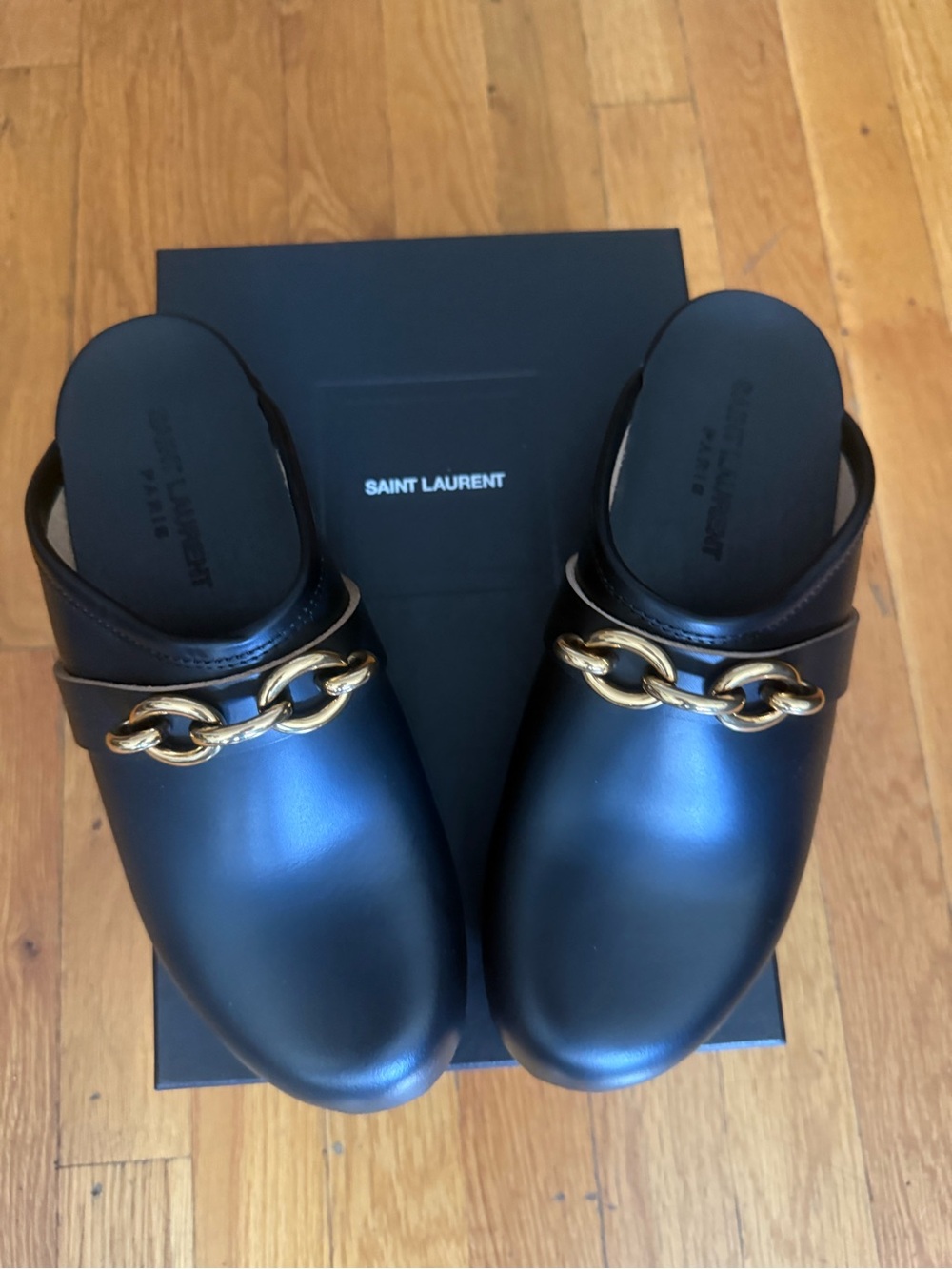 Saint Laurent Black Leather Mules with Gold Chain Accent